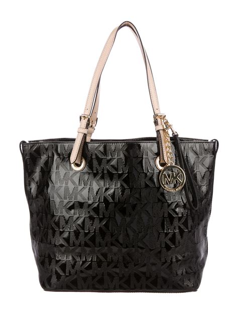 coque michael kors|Michael Kors leather tote.